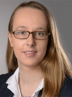 anna lena with glasses and smiling