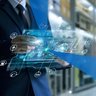 Businessman holding virtual interface panel of global logistics network distribution and transportation, Smart logistics, Innovation future of transport on large warehouse center background