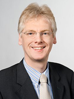 prof stefan minner with glasses smiling 