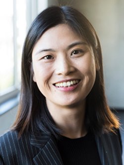 lei fang with short black hairs and smiling
