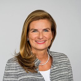 Prof. Dr. Headshot of Prof. Dr.Dr. Dr. h.c. Ann-Kristin Achleitner, a middle age woman smiling on a simple white background.