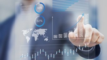 Businessman touching financial dashboard with key performance indicators