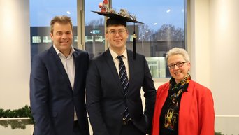 Prof. Jan van Hourum, Florian Sachs, and Prof. Gudrun Kiesmüller