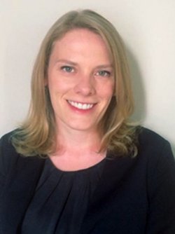 anne demurath with short hairs smiling 